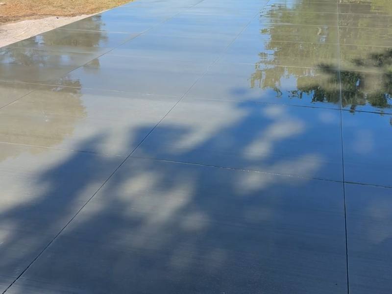 Video: freshly finished concrete patio reflecting the sky