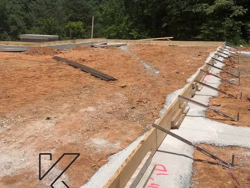 Formed footings with rebar in place, ready for a foundation pour
